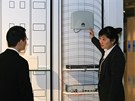 Femtocell v pod�n� Huawei. Firemn� sn�mek z prezenta�n� m�stnosti v �en-�enu. 