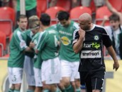 RADOST A ZKLAMÁNÍ. Zatímco Lukáš Pleško z Příbrami (vpředu) smutní, hráči