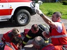 Motorov� vlak peugeota z p�ejezdu odtla�il. Ve vraku auta zahynula