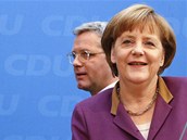 N�mecká kanclé�ka Angela Merkelová a bývalý ministr �ivotního prost�edí Norbert