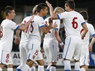 G�LOV� OSLAVA. Fotbalist� se raduj� z prom�n�n� penalty Milana Baro�e (��slo