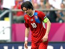 BOLÍ TO. Výraz ve tvá�i kapitána �eské fotbalové reprezentace Tomá�e Rosického