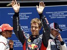 V�MLUVN� SN�MEK. Sebastian Vettel se raduje z v�t�zstv� v kvalifikace na Velkou