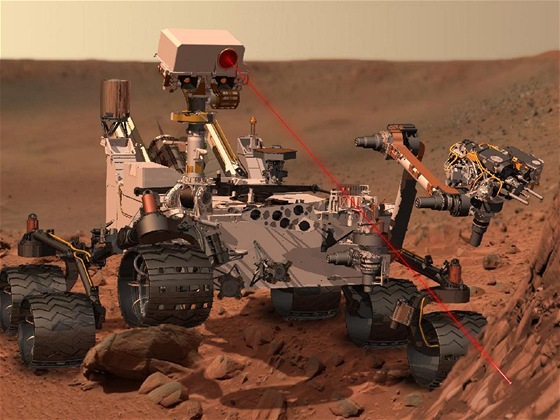 Takto si grafik představuje Curiosity v činnosti na povrchu Marsu. Takto si grafik představuje Curiosity v činnosti na povrchu Marsu.