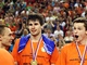 Ond�ej Lach, Peter Michalovi� a Jan Rodek (zleva) s medailemi.