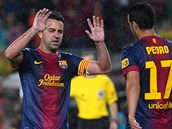 OSLAVA. Pedro Rodriguez (uprostřed) slaví svůj gól proti Valladolidu s Xavim, OSLAVA. Pedro Rodriguez (uprostřed) slaví svůj gól proti Valladolidu s Xavim,