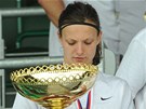 Lucie Vo�kov� s �esk�m poh�rem, kter� vybojovala s pra�skou Spartou.