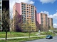 Panel�k s barevnou fas�dou a nov�mi okny vypad� podstatn� l�pe ne� d�m p�ed