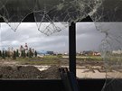 A view of Olympic venues and accommodation complex is seen through the window... A view of Olympic venues and accommodation complex is seen through the window...