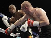 TVRDÝ BOJ. Lukáš Konečný (vpravo) a Peter Quillin bojují o titul mistra světa TVRDÝ BOJ. Lukáš Konečný (vpravo) a Peter Quillin bojují o titul mistra světa